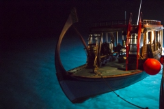 Boat tender, at night